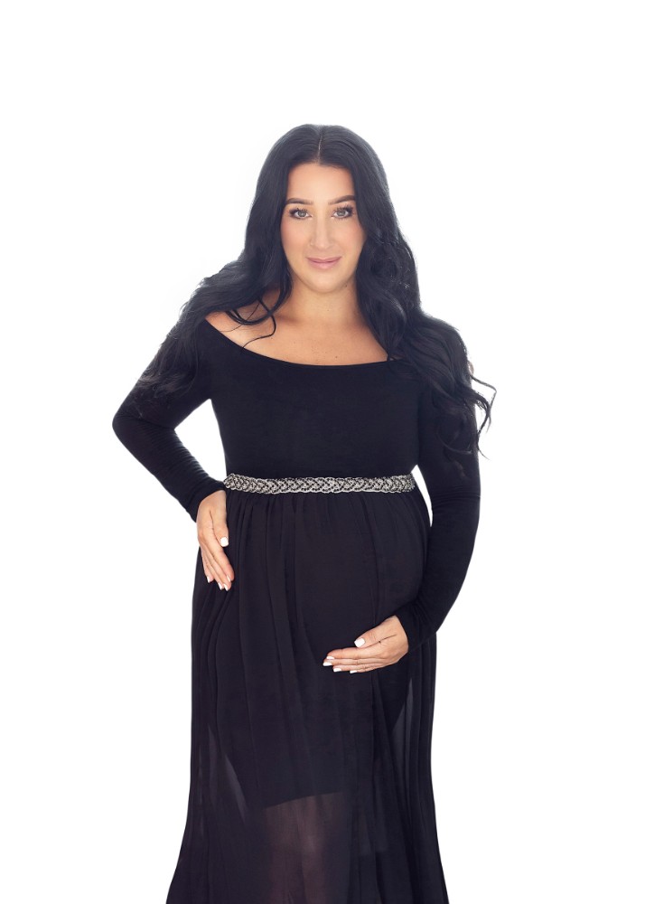 Chic black maternity dress highlighting elegance in Witham, Essex