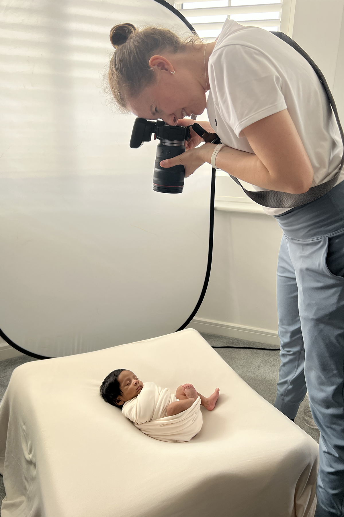 In-home newborn photography session in Essex capturing a sleeping newborn baby